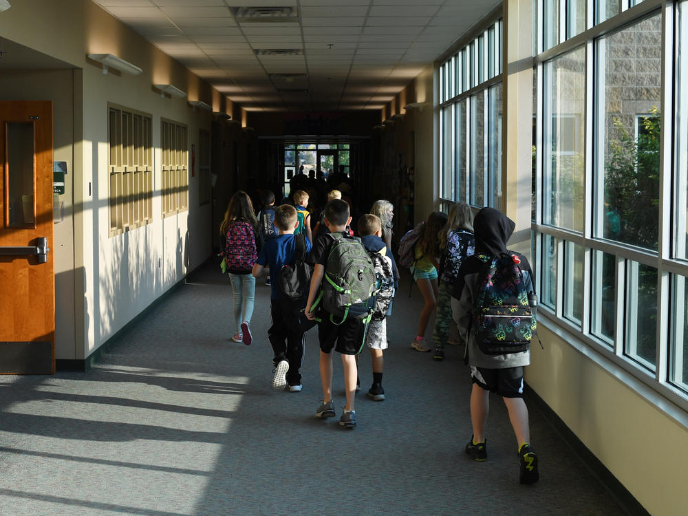 Students head to class this month in Thornton, Colo. Infectious disease experts say the decline in vaccination rates against childhood diseases during the pandemic has increased the potential for outbreaks of diseases once largely vanquished in the United States.