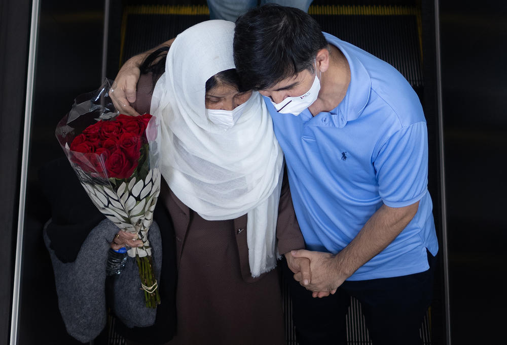 <strong>Mon., Aug. 16: </strong>Family members greet refugees evacuated from Kabul in Dulles, Virginia.