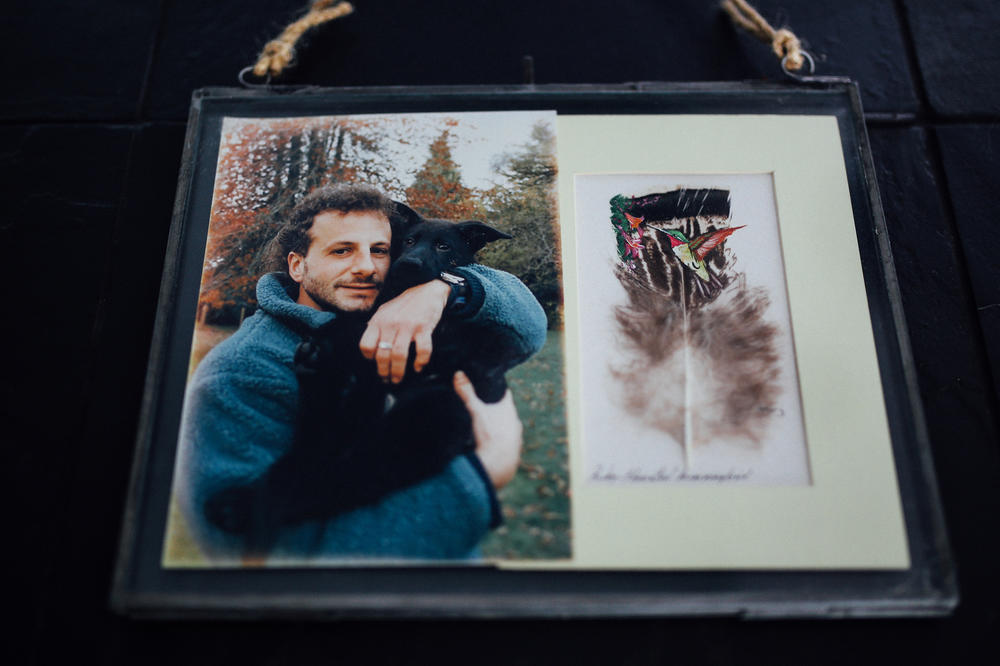 A photo of Richard Guadagno hugging his dog Raven hangs in his sister Lori's home. He died when United Airlines Flight 93 crashed outside Shanksville, Pa., on Sept. 11, 2001.