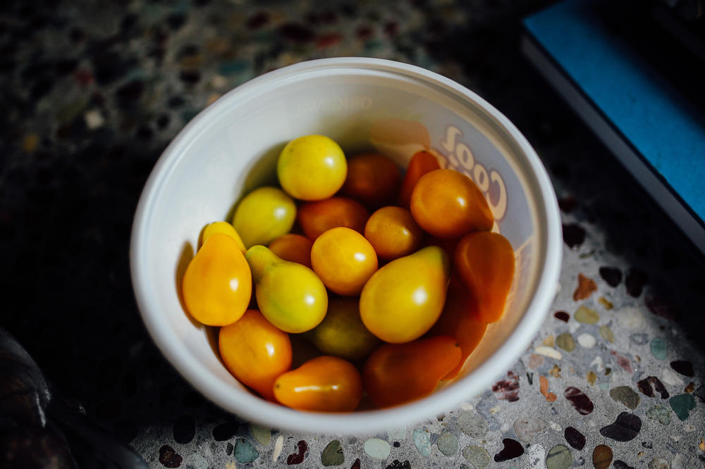A neighbor delivered yellow cherry tomatoes from his garden to Lori Guadagno. She saw it as a sign from her brother since his home in California was filled with tomato vines.