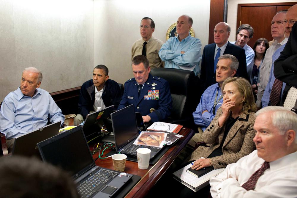 In this May 1, 2011 file image released by the White House and digitally altered by the source to diffuse the paper in front of Secretary of State Hillary Rodham Clinton, President Barack Obama and Vice President Joe Biden, along with with members of the national security team, receive an update on the mission against Osama bin Laden in the Situation Room of the White House in Washington.
