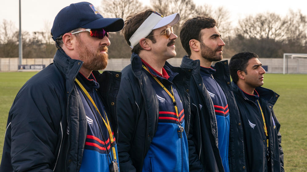 Brendan Hunt, Jason Sudeikis, Brett Goldstein, and Nick Mohammed play a coaching staff in flux.