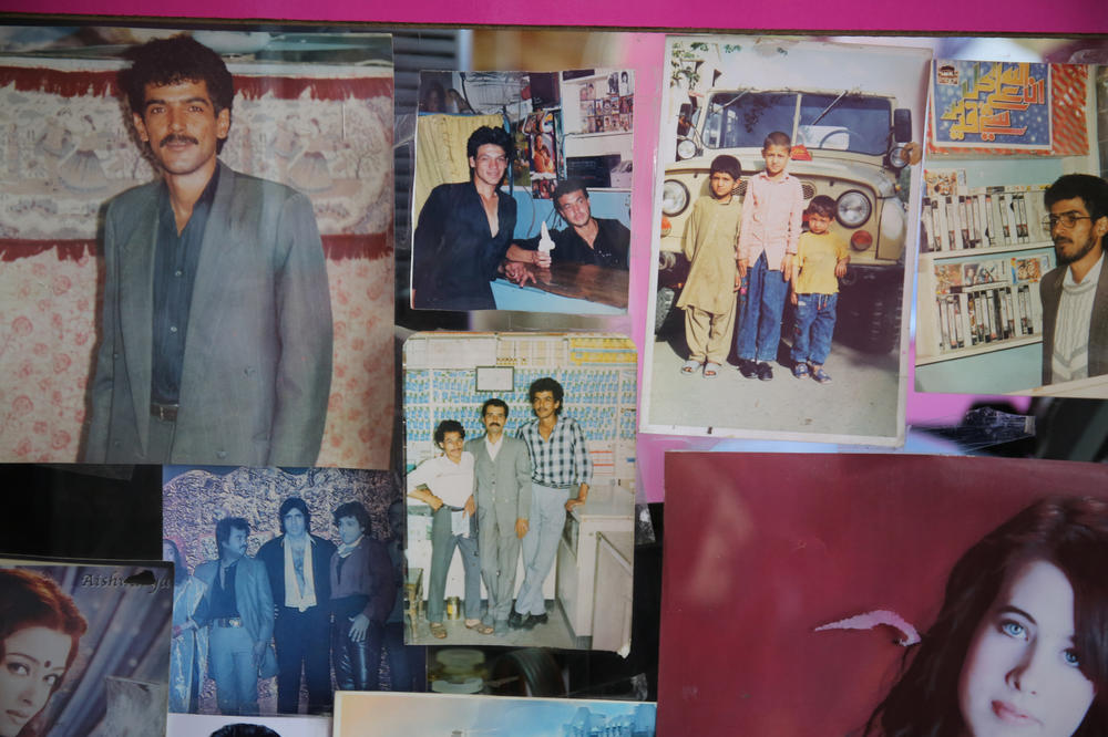 Unclaimed photographs decorate a small photo studio in the west of the capital.