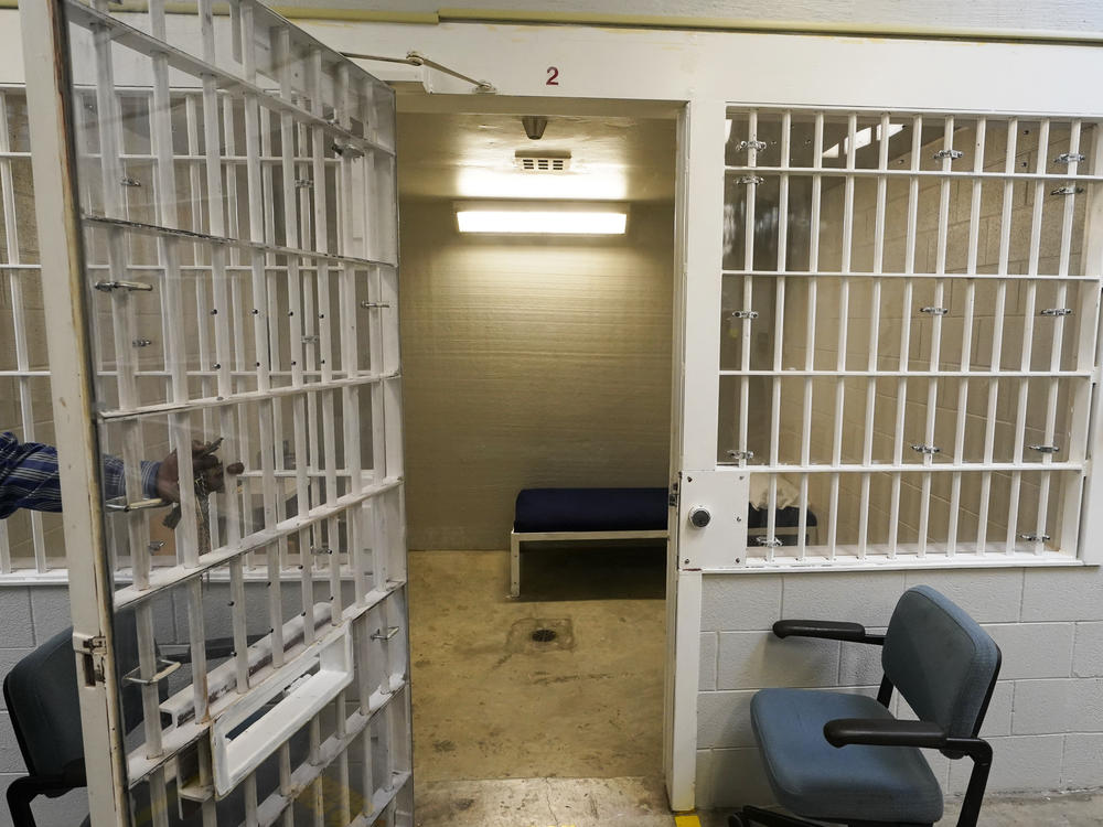 A bed is seen through the bars in one of the holding cells near the death chamber at Greensville Correctional Center in Jarratt, Va., earlier this year. The state no longer allows the death penalty.