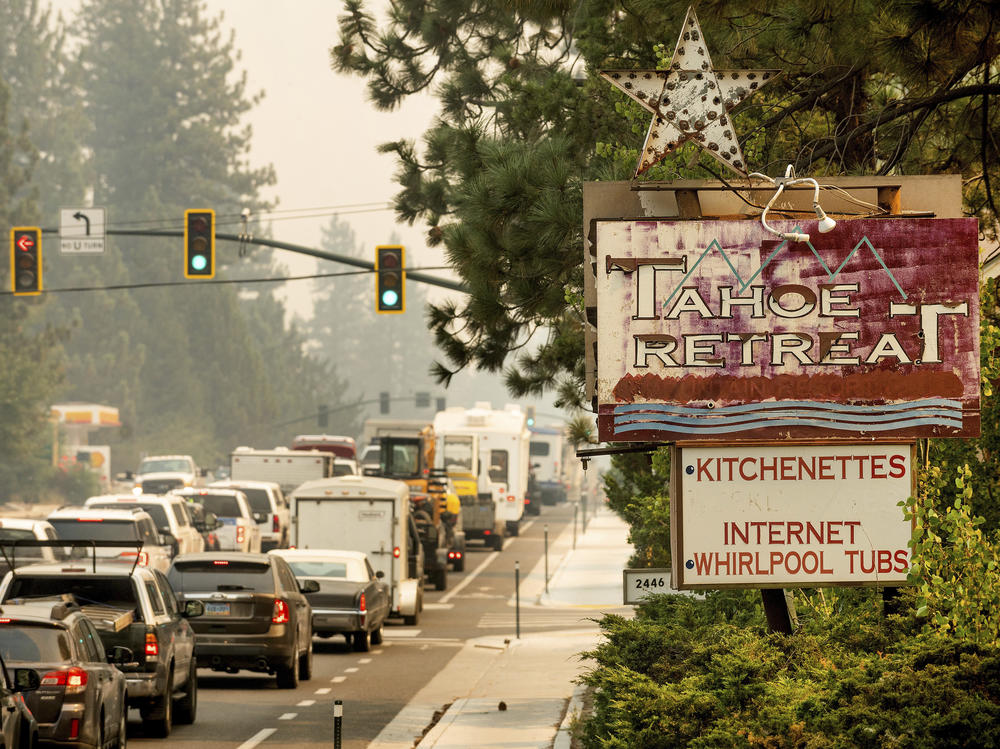 With the Caldor Fire approaching, traffic on Highway 50 stands still as South Lake Tahoe, Calif., as residents try to evacuate on Monday, Aug. 30, 2021.