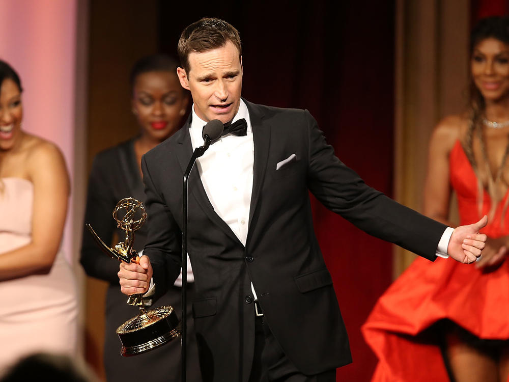 Mike Richards accepts a Daytime Emmy Award for outstanding game show for <em>The Price is Right</em> in 2016.