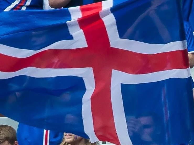 Iceland's soccer federation is in turmoil, after a scandal over sexual assault allegations against players prompted a mass resignation. Here, the country's flag is seen in the stands during an international match.