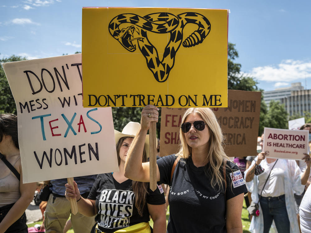 Protesters demonstrate outside the Texas Capitol in Austin in late May in response to a bill that outlaws abortions after a fetal heartbeat is detected.