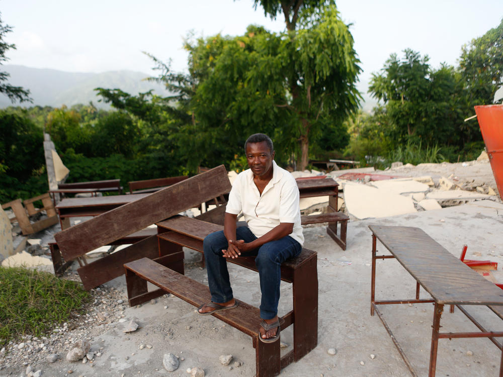 The Rev. Calixte Dorval in the remains of the Mission Evangélique Baptiste du Sud d'Haiti Picot in Marceline, Haiti, which was destroyed in the 7.2 magnitude earthquake.