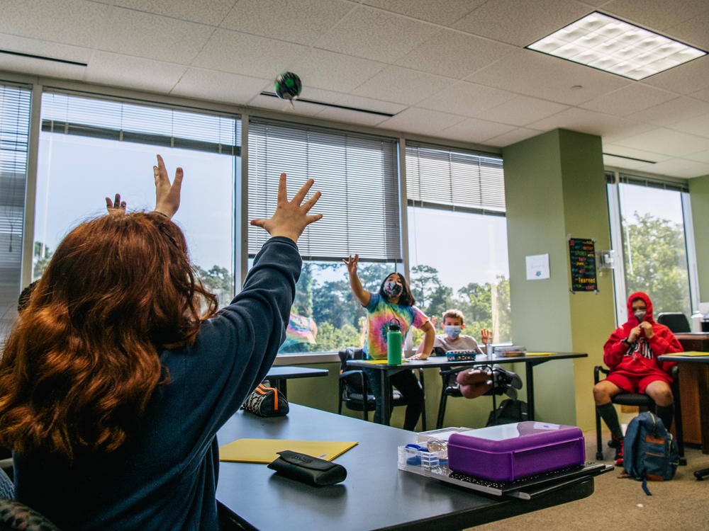HOUSTON, TEXAS - AUGUST 23: Students at the Xavier Academy, like many schools around Houston, are required to wear masks. Staff and faculty have been vaccinated and 90% of students in attendance have also been vaccinated.