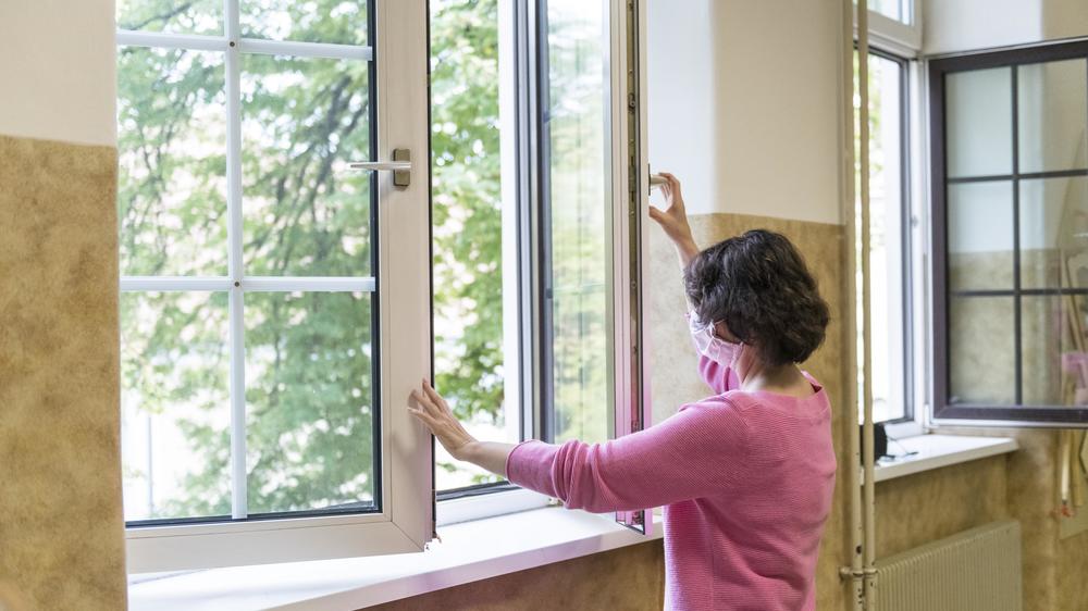 Keeping doors and windows open to create cross ventilation is important in dispersing viral particles.