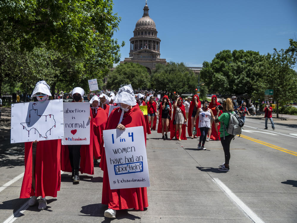 Leaders at two dating-app giants in Texas — Match Group and Bumble — have moved to set up funds to aid people affected by the state's new abortion ban. Here, abortion-rights supporters march near the Texas Capitol in Austin this year.