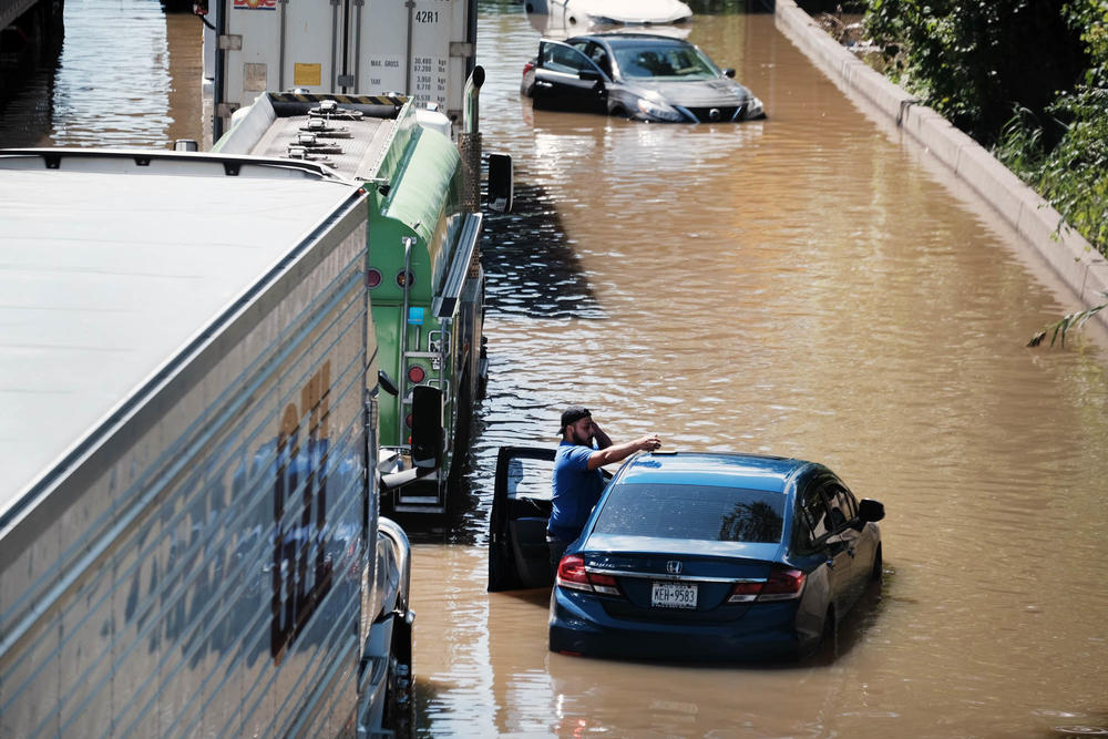 Cars sit abandoned on the flooded Major Deegan Expressway in the Bronx after Hurricane Ida barreled through on Wednesday into Thursday.