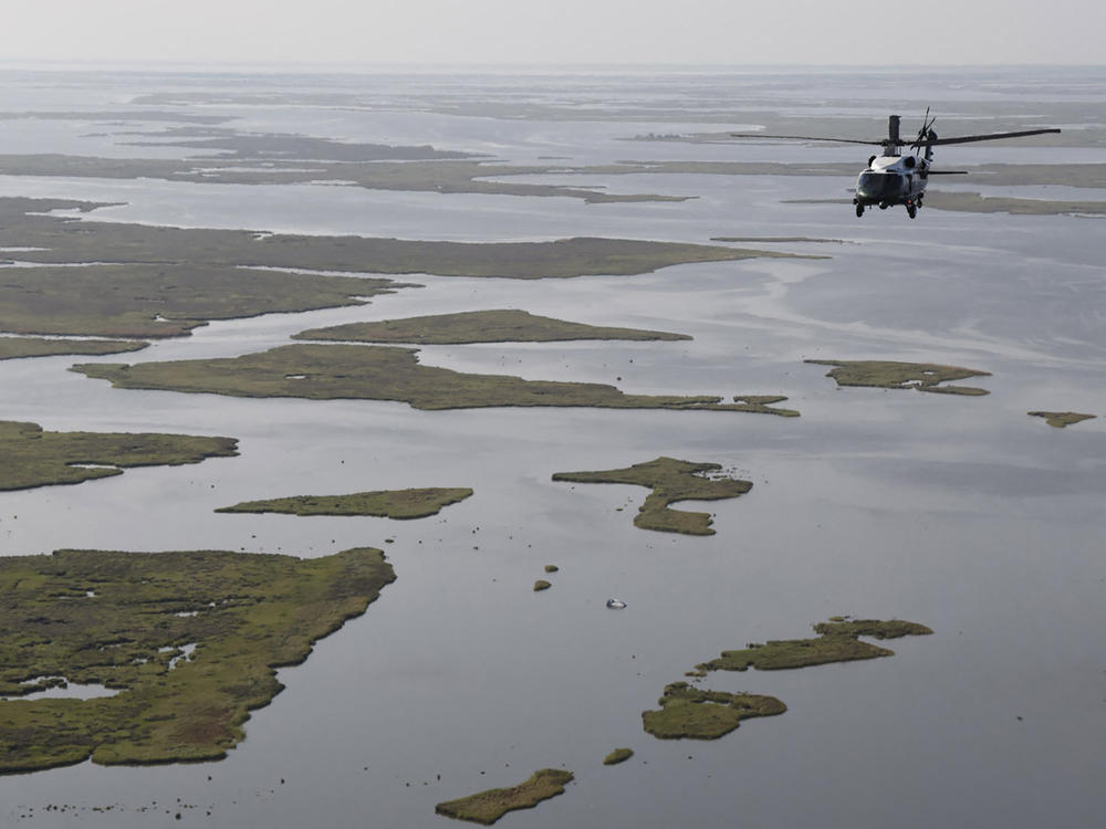 President Biden, aboard Marine One, inspects the damage from Hurricane Ida on an aerial tour of communities in Laffite, Grand Isle, Port Fourchon and Lafourche Parish, Louisiana, on Sept. 3, 2021. Port Fourchon is a major oil and gas hub in the Gulf region.