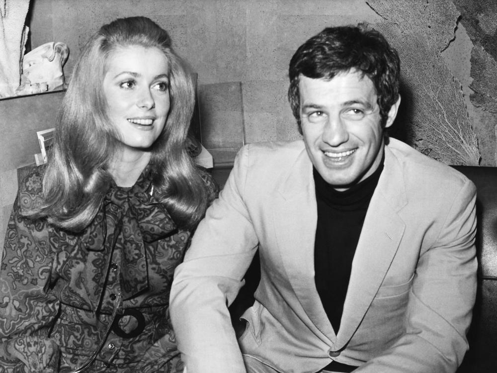 French actors Jean-Paul Belmondo, right, and Catherine Deneuve, in 1969. They starred together in François Truffaut's film <em>Mississippi Mermaid. </em>