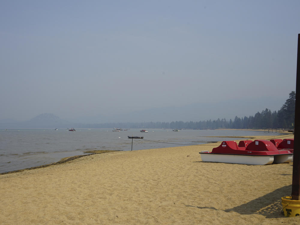 Smoke shrouds parts of Lake Tahoe visible from the Ski Run Marina in downtown South Lake Tahoe on Monday.