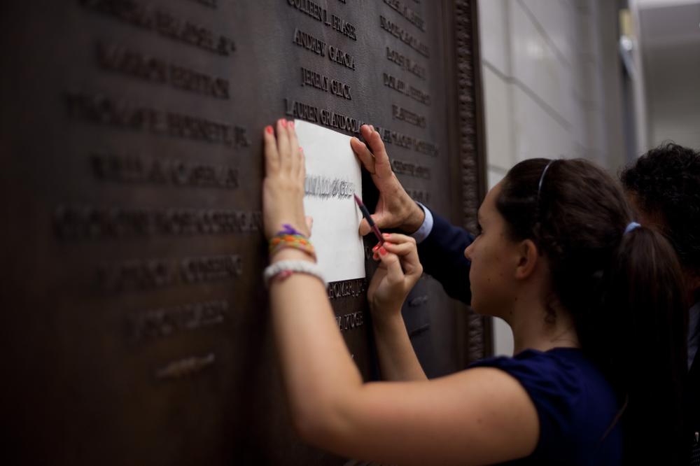 Jody Greene makes an etching of her father's name, Donald F. Greene, from a plaque in the U.S. Capitol that was unveiled in 2009. The plaque honors the passengers and crew from the hijacking of United Flight 93.