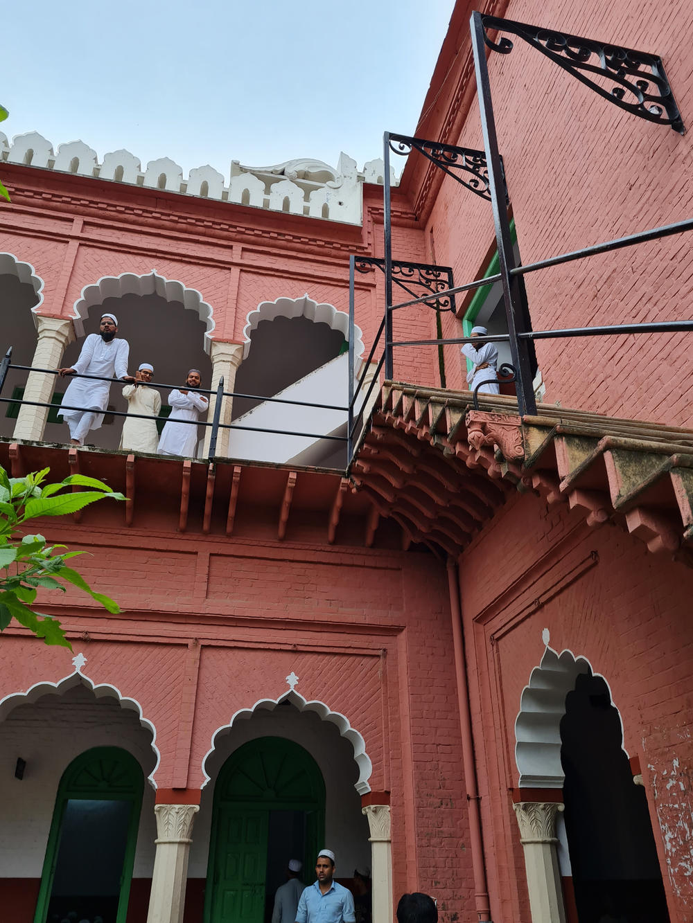 Students mill around between classes at the Darul Uloom seminary. In the 19th century, this seminary founded the Deobandi school of Islam.