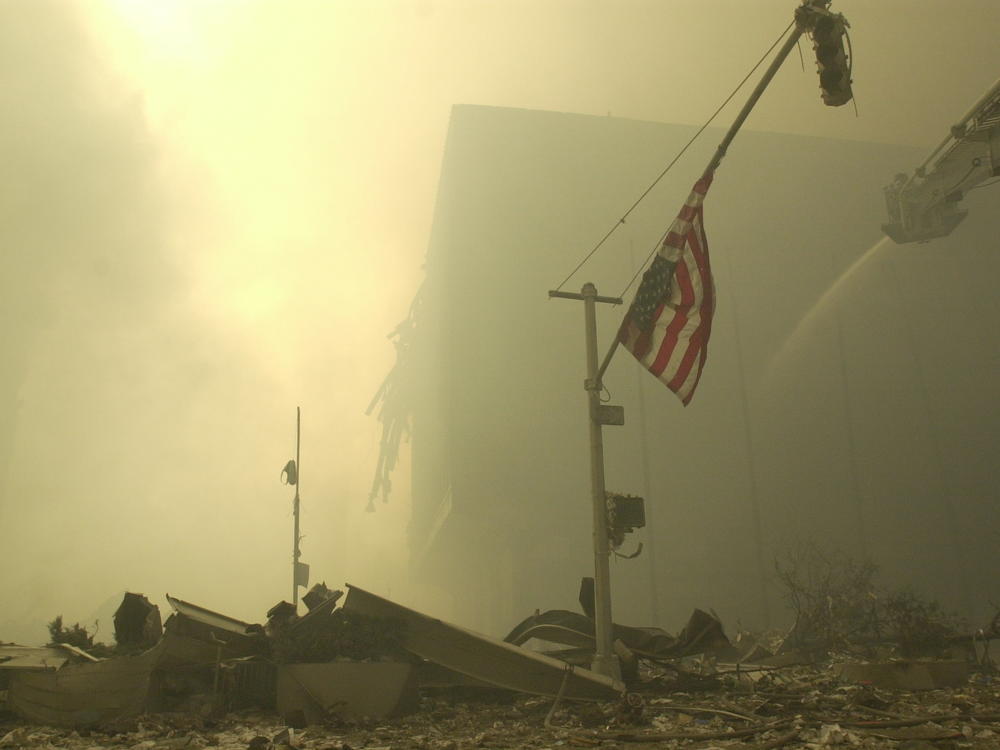 An American flag at ground zero on the evening of Sept. 11, 2001, after the terrorist attacks on the World Trade Center in New York City.