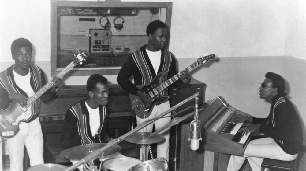 The Upsetters performing in the studio in an early, but undated, photograph.