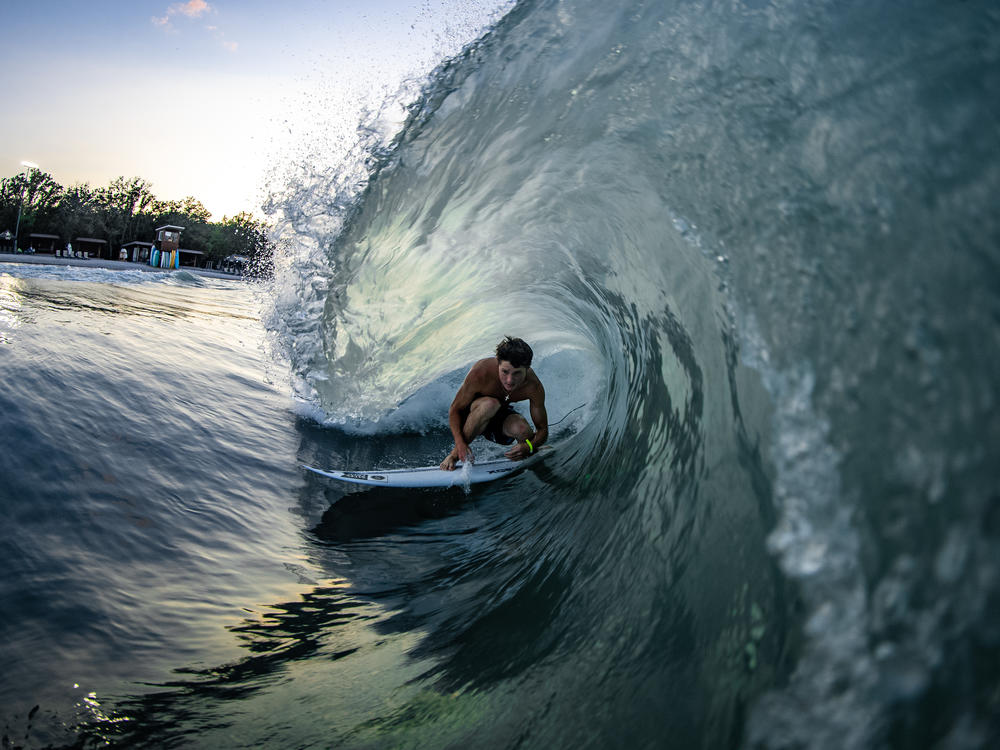 Ben Elliott gets barreled at the BSR Surf Resort, where artificial waves are attracting world-class talent.
