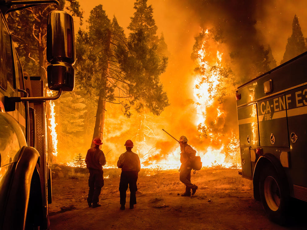 Crews set a backfire in an effort to gain control of the massive Caldor fire near the Tahoe basin in California on Aug. 26.