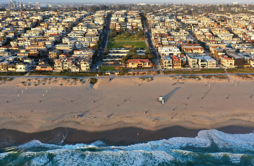 An aerial view shows Bruce's Beach (center) wedged between expensive real estate in April in Manhattan Beach.