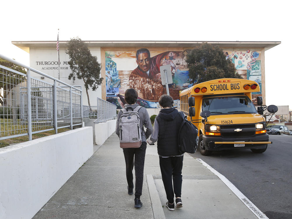 Students head toward Thurgood Marshall Academic High School in San Francisco in March.