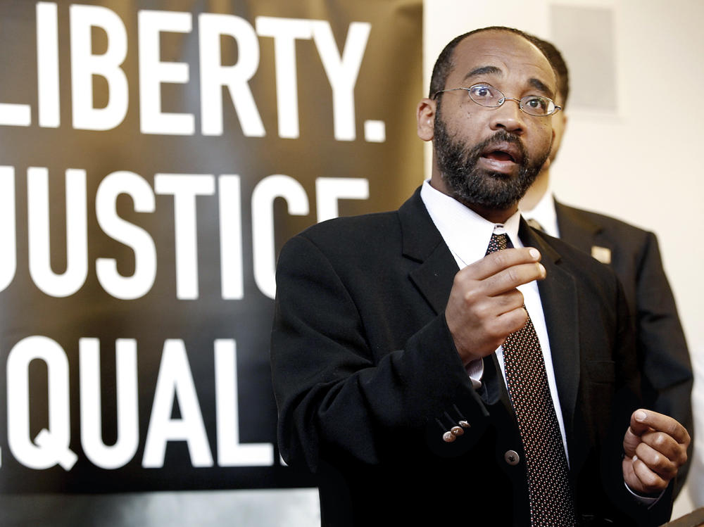 Yassir Fazaga, a religious leader of the Orange County Islamic Foundation takes questions from the media, as he announces a lawsuit against the FBI at the ACLU Foundation of Southern California headquarters in Los Angeles on Feb. 23.