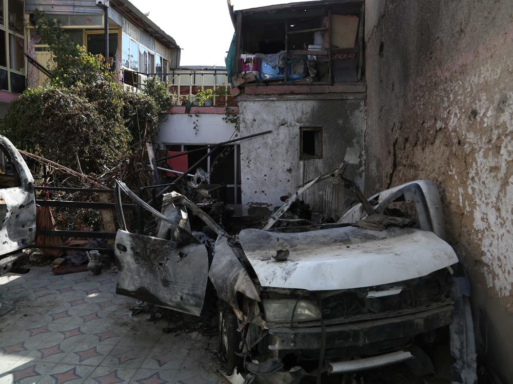 The aftermath of a U.S. drone strike on a car allegedly driven by Zemari Ahmadi.