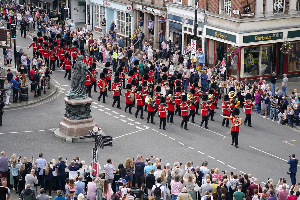 Military personnel arrive for the changing of the guard at Windsor Castle on Saturday in London. People across the U.K. are paying their respects to the victims of the Sept. 11 terror attacks in the U.S.