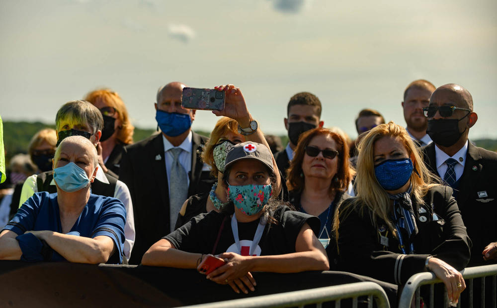 People listen as Vice President Harris speaks on Saturday at the 20th anniversary remembrance of the Sept. 11 terrorist attacks at the Flight 93 National Memorial in Shanksville.