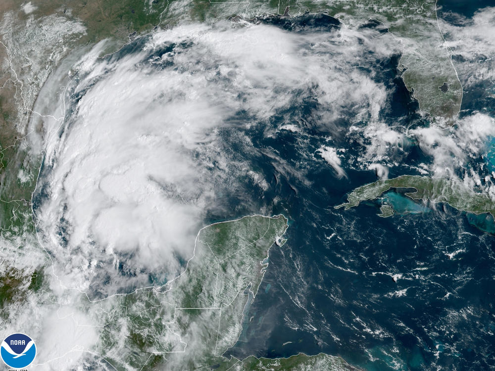 This satellite image provided by NOAA shows Tropical Storm Nicholas in the Gulf of Mexico on Sunday.
