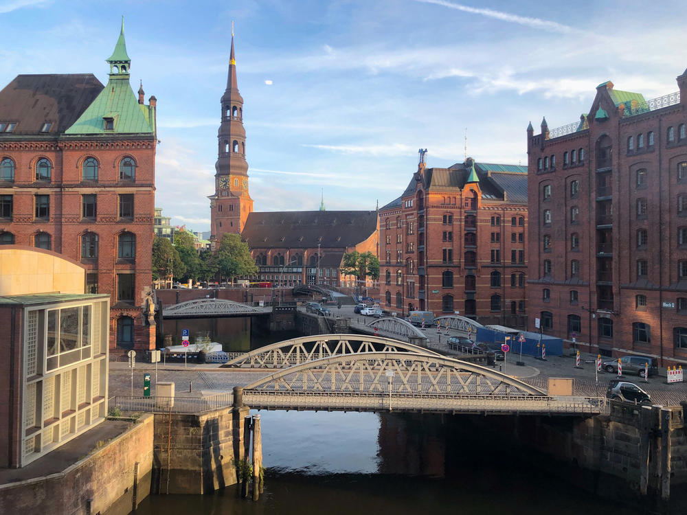 The harbor district of Hamburg is filled with new hotels and loft apartments and is crisscrossed by canals. Former Mayor Olaf Scholz helped transform this district from one of run-down warehouses into a thriving cultural district.