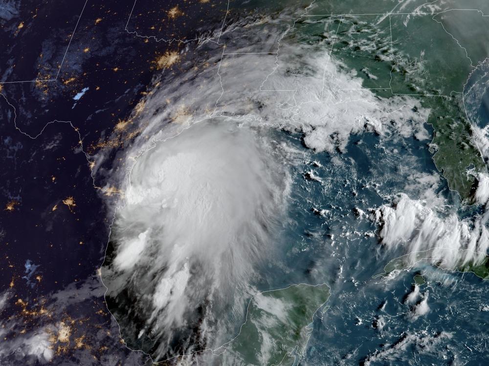 Tropical Storm Nicholas filled a large portion of the Gulf of Mexico on Monday morning as seen in this satellite photo taken around sunrise.
