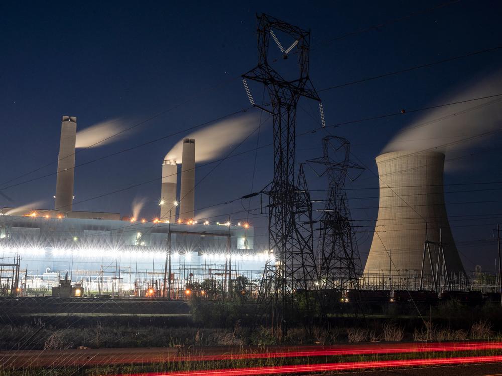Steam rises from the Miller coal power plant in Adamsville, Ala., in April. An industry group says a climate plan in Congress would shut down all U.S. coal plants by 2030 or earlier.