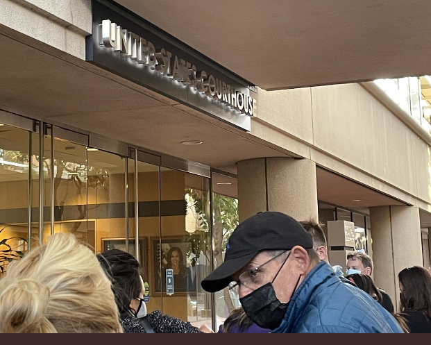 Bill Evans, father to Elizabeth Holmes' partner Billy Evans, attended jury selection incognito — as a baseball-hat-wearing citizen who called the coverage of Holmes unfair.