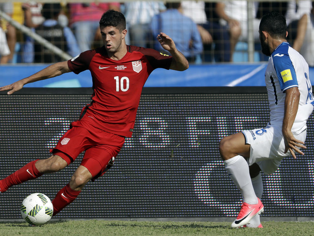 U.S. soccer player Christian Pulisic controls the ball during a World Cup qualifying match against Honduras in San Pedro Sula, Honduras, in September 2017.