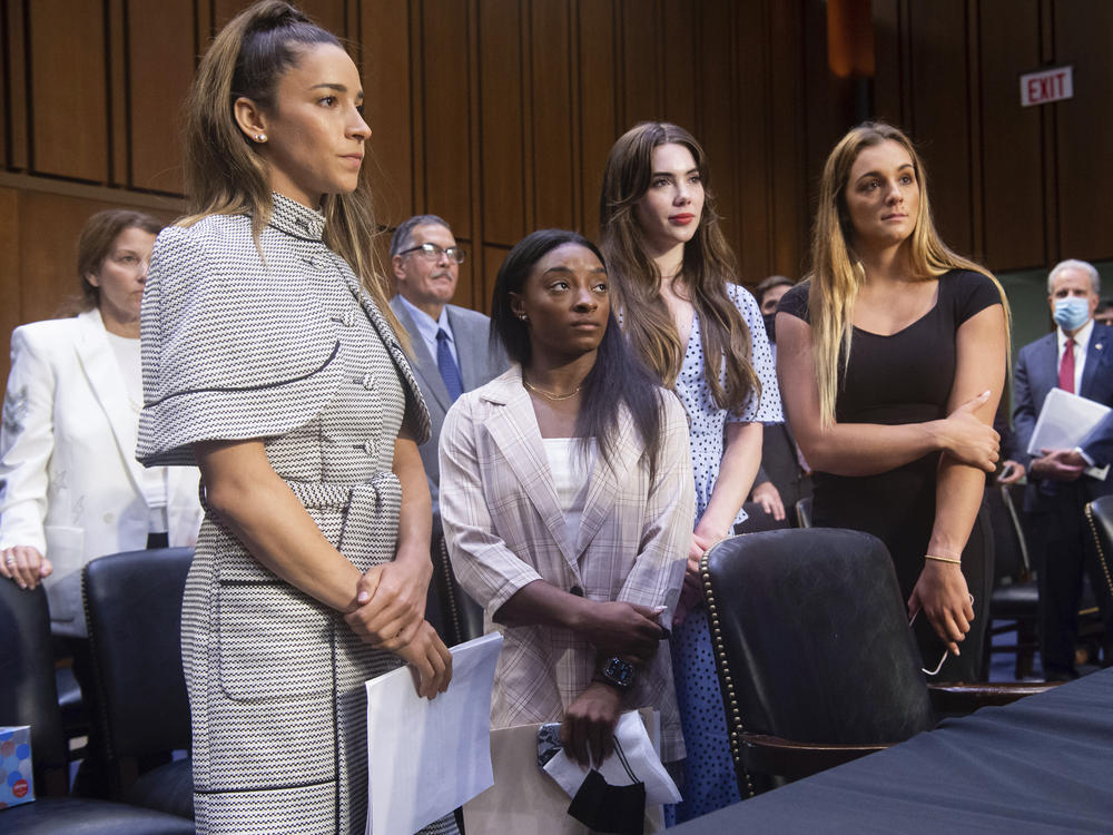 Gymnasts (from left) Aly Raisman, Simone Biles, McKayla Maroney and Maggie Nichols leave after testifying Wednesday at a Senate Judiciary Committee hearing on the FBI's handling of the Larry Nassar investigation. Nassar was charged in 2016 with federal child pornography offenses and sexual abuse charges in Michigan and is now serving decades in prison.