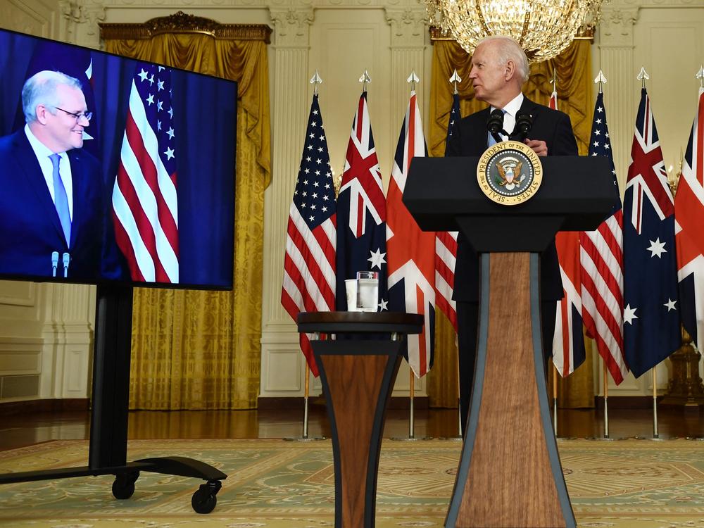 President Biden speaks to Australian Prime Minister Scott Morrison on Wednesday during the virtual announcement of a trilateral defense partnership with Australia and the U.K. British Prime Minister Boris Johnson also joined in.