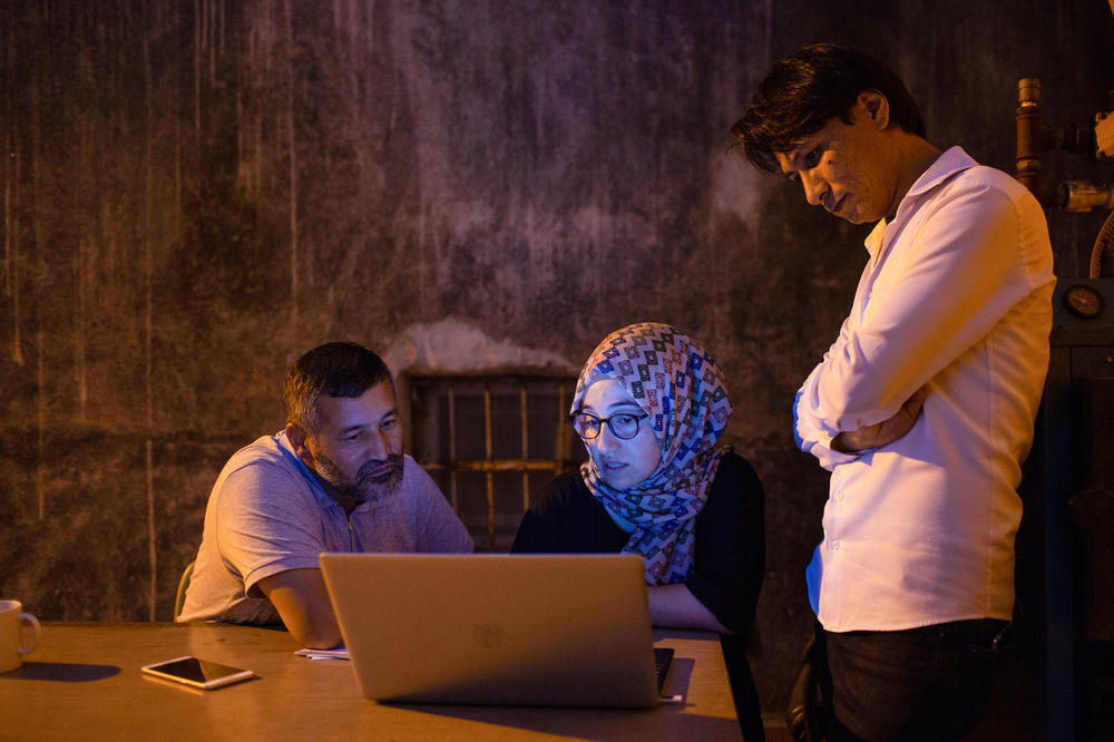 Staff at the Afghanistan Hazaras Culture and Solidarity Organization assist refugees from Afghanistan in Trabzon, Turkey. They estimate at least 35 families have arrived in the city from Afghanistan in the past three months, although the Turkish government says it has blocked more than 40,000 Afghans from crossing through Turkey's borders.