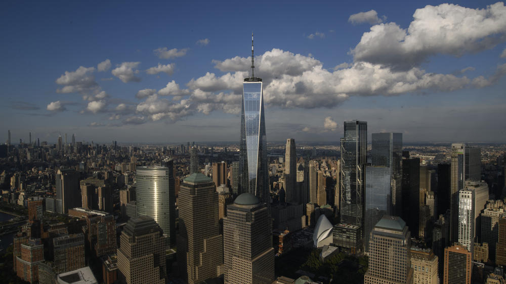 An aerial view shows One World Trade Center and the Manhattan skyline.