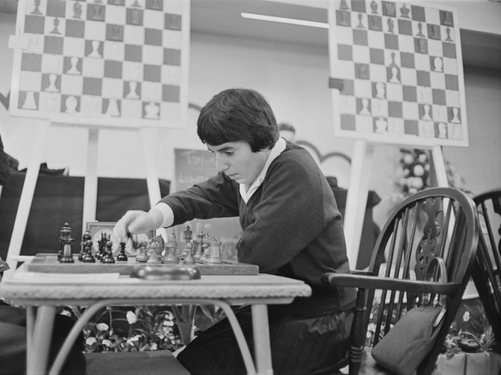 Georgian chess champion Nona Gaprindashvili plays at the International Chess Congress in London on Dec. 30, 1964. She is suing Netflix for defamation and invasion of privacy over its series <em>The Queen's Gambit.</em>