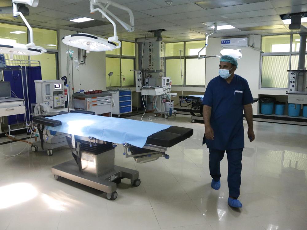 A newly-opened COVID-19 hospital in Kabul. Dr. Wahid Majrooh, the acting minister of public health in Afghanistan, must address the pandemic's toll at a time when the Taliban takeover has triggered a freeze in hundreds of millions of dollars in health-care aid from outside groups.