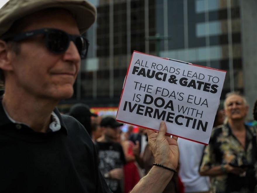 A protester at a September rally to protest vaccination mandates in New York City carries a sign supporting ivermectin.