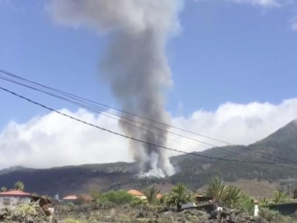 This image taken from video shows the volcanic eruption in La Palma filmed by a resident. The volcano on Spain's Atlantic Ocean island of La Palma erupted Sunday after a weeklong buildup of seismic activity.