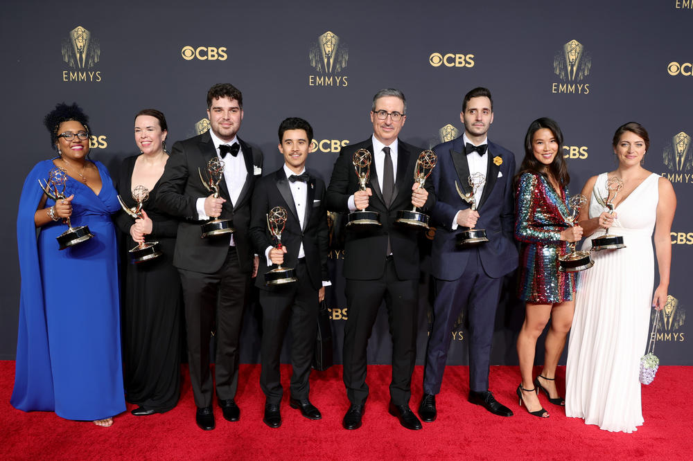 John Oliver (C), winner of the awards of Outstanding Variety Talk Series and Outstanding Writing for a Variety Series poses with fellow writers.