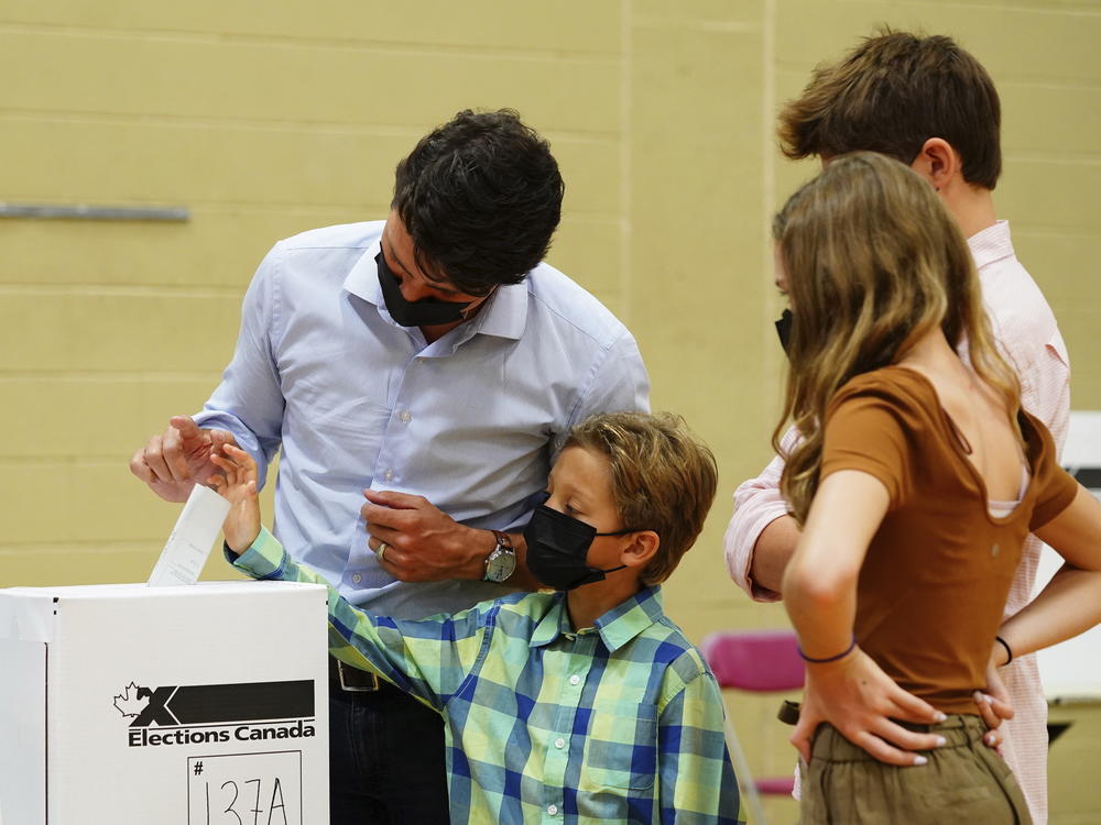 Liberal leader Justin Trudeau casts his ballot in the 44th general federal election. He's joined by his children, Xavier, Ella-Grace and Hadrien in Montreal on Monday.