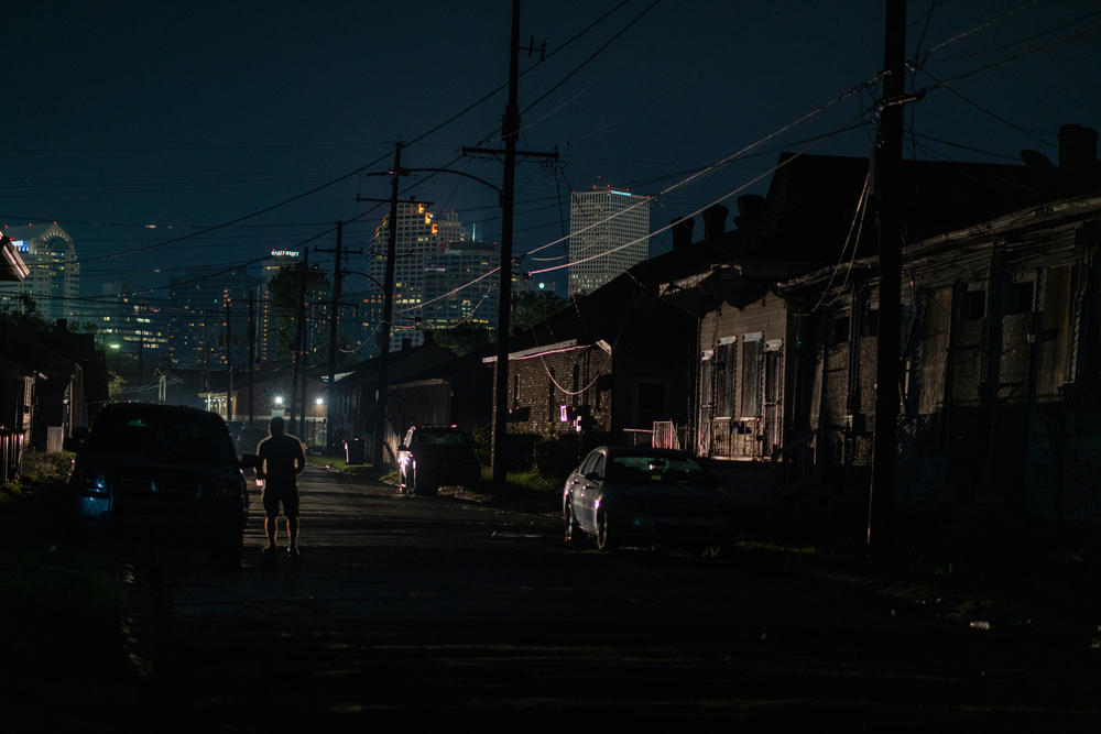 Lights are on in downtown New Orleans while Central City remains dark.