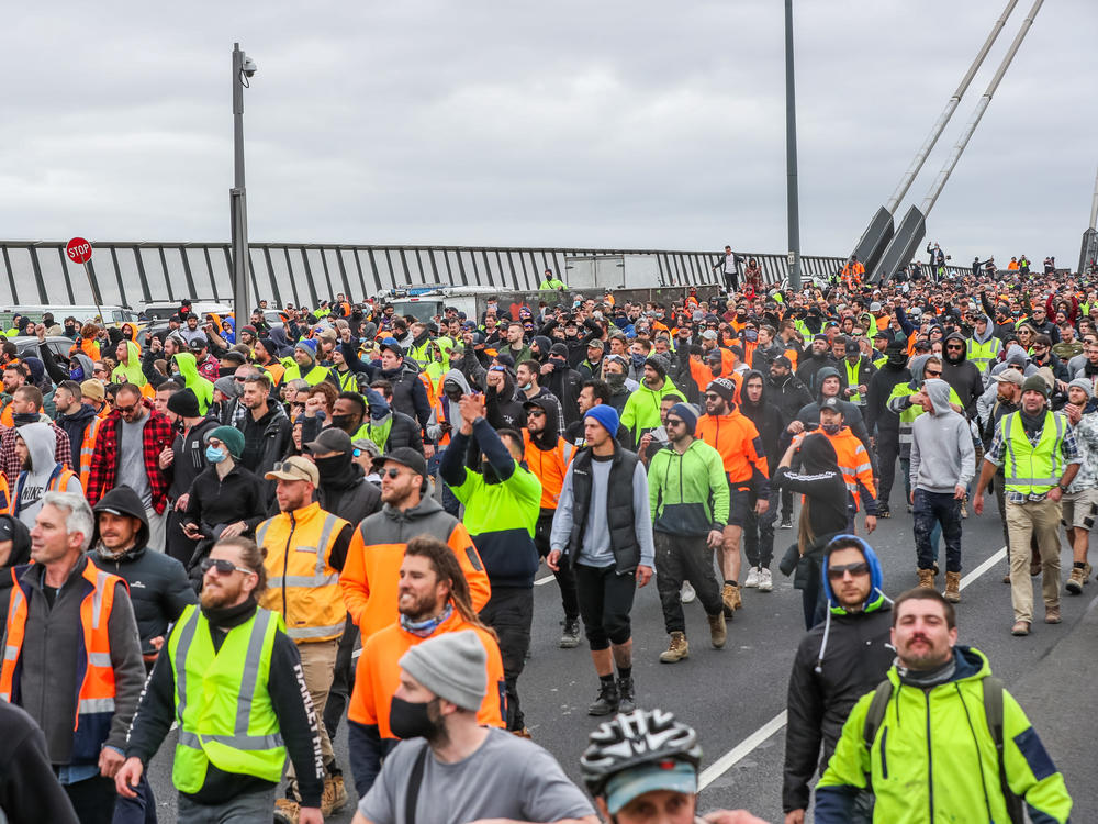 Crowds march down the West Gate Bridge in Melbourne on Tuesday, the second day of growing protests.